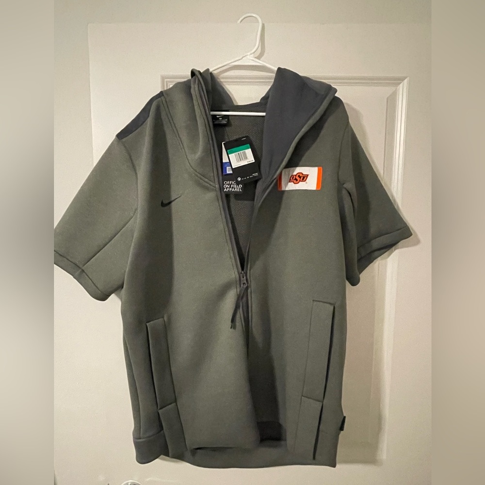 Oklahoma State University short sleeve jacket. Brand new with tags.